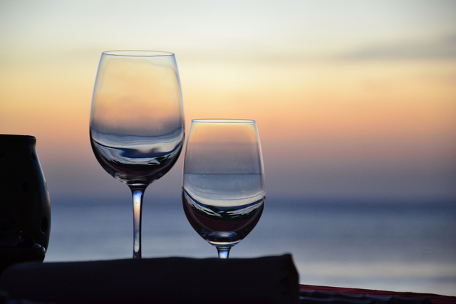 wineglasses overlooking Jimbaran Bay, Bali.