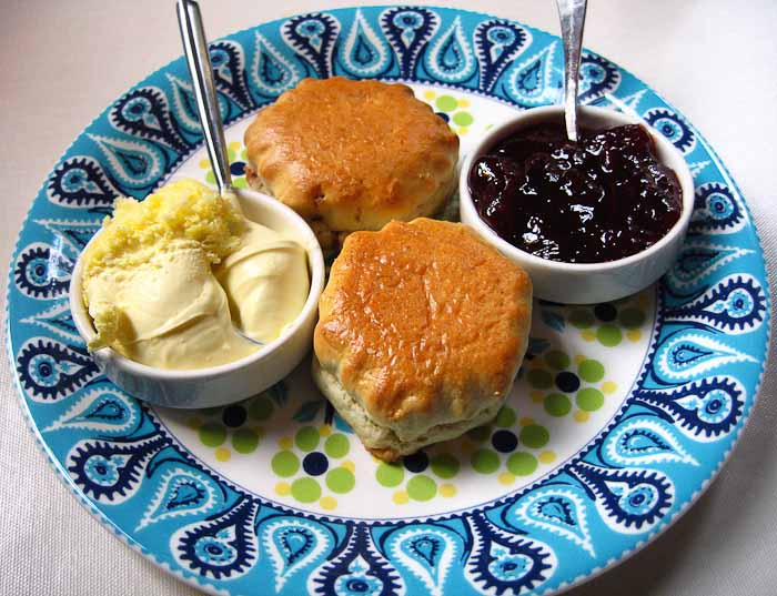 Cream tea with scones, jam and clotted cream.