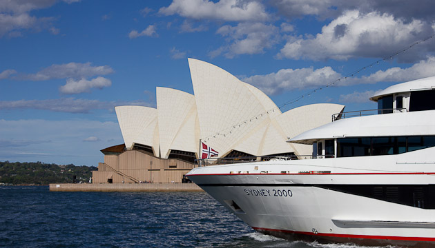 Sydney Opera House with boat in foreground.