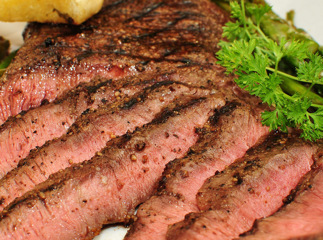 Mmm... grilled flat iron steak with cracked black peppercorns - by Jeffry M on Flick's creative commons